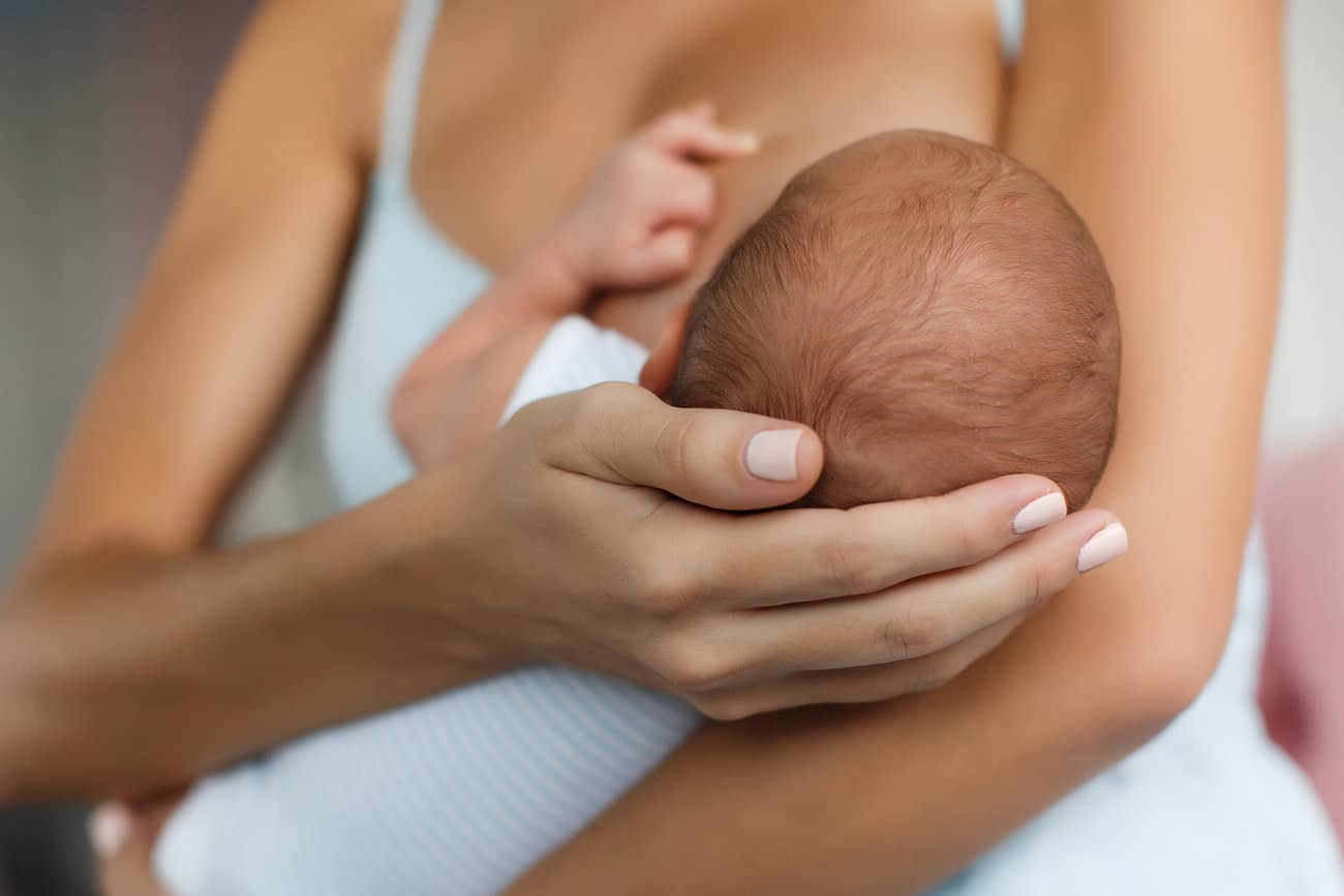 Image of baby breastfeeding